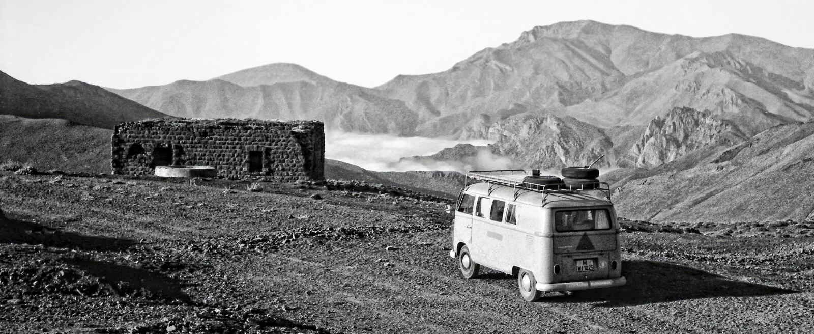 A Kombi travels through the rocky terrain of Afghanistan, 1973-1974. [Credit] Txmx 2